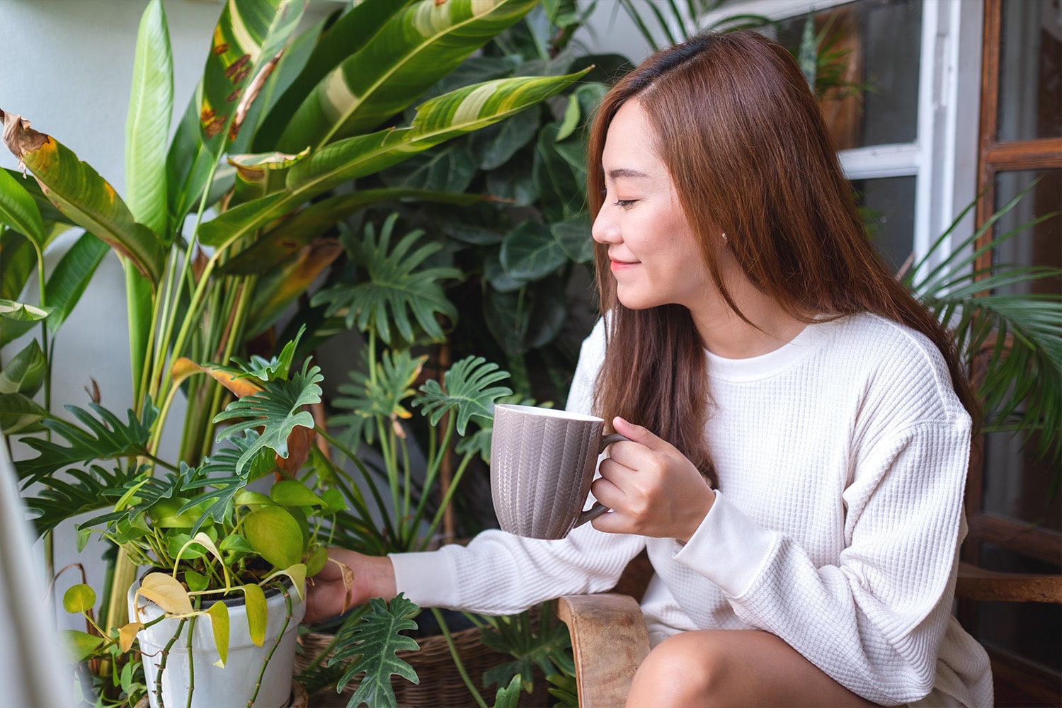 woman drinking hot coffee