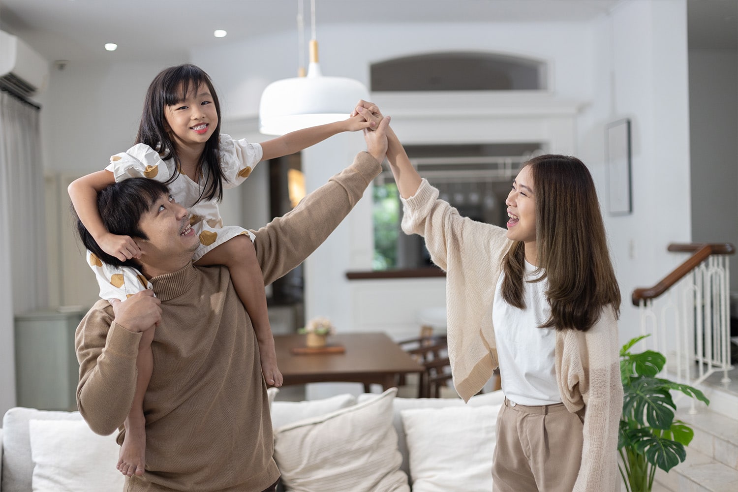 family playing in the living room